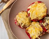A picture of step 5 of Bolognese Stuffed Peppers.