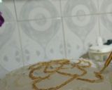 A picture of step 16 of Golden painted choc cake design.....