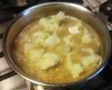 A picture of step 7 of Cauliflower white Korma Malabar masala curry.