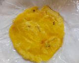 A picture of step 3 of Patacones or Tostones with minced chicken topping.