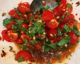 A picture of step 5 of Red snapper and tomato aglio e olio.