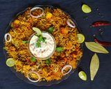 A picture of step 8 of Paneer Biryani in pressure cooker.