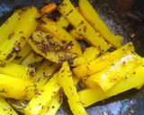 A picture of step 5 of Neem aloo fry.