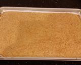 A picture of step 8 of Carrot Cake Roll with Whipped Cinnamon Cream Cheese Filling and Frosting.