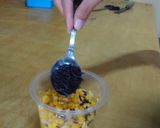 A picture of step 2 of Jasuke (Sweet Corn with milk and cheese/chocolate).