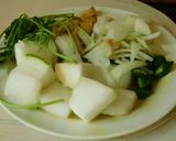 A picture of step 1 of Rice with Ash Pumpkin Porichcha Koottu.