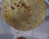 A picture of step 3 of Paratha with leftover potato masala.