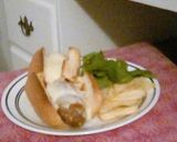 A picture of step 4 of Homade Meatball Subs.