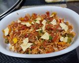 A picture of step 4 of Mexican rice pulao.