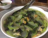 Hình bước làm 2 của món Canh bầu nấu ngao hoa