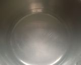 A picture of step 1 of Tulsi Ginger Tea.