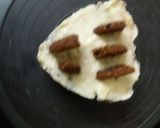 A picture of step 8 of Mariegold biscuits  cake.