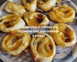 Foto del paso 9 de la receta: Caracolas o rollitos de hojaldre con mermelada y pasas