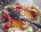 A picture of step 4 of Sig's Tomato and potato mash filled potato boats.