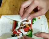 A picture of step 9 of Malai Boti Shawarma Roll.