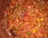 A picture of step 3 of Egg Bhuji with veggies.