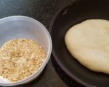 A picture of step 4 of Mochi with ground peanuts.
