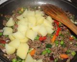 A picture of step 2 of Qeema Naan.