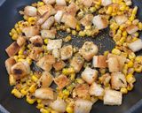 A picture of step 2 of Homemade croutons and sweet corn toppings 🌽.