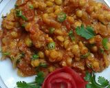 A picture of step 6 of Brinjal with Daal channa.