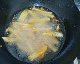 A picture of step 4 of Masala fries.