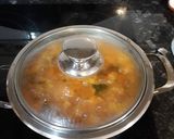 Foto del paso 5 de la receta Arroz meloso con tómate frito y bacalao