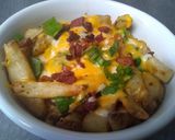 Foto del paso 5 de la receta: Papas rostizadas con queso cheddar, tocineta y cebollín