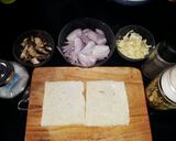 A picture of step 1 of French toast with mushroom filling.