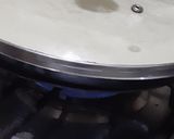 A picture of step 5 of Chocolate vanilla Swiss roll in fry pan.