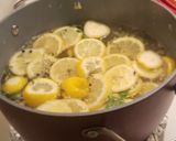 A picture of step 4 of Lemon herb rotisserie chicken.