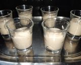 A picture of step 4 of Orange lemon posset shoters.