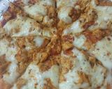 A picture of step 5 of Chéésy cheese 🧀 chicken 🐔 pizza 🍕🍕.