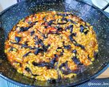 Foto del paso 8 de la receta: Arroz meloso con pollo y trompetas de la muerte