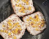 A picture of step 3 of Cheese spread corn toast 🌽.
