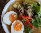 A picture of step 12 of Beef bone broth with noodles.