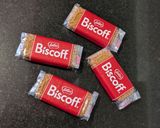 A picture of step 1 of Biscoff strawberry cheese cake in glass.
