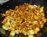 A picture of step 2 of Lauki matar curry.