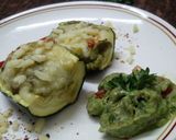 A picture of step 7 of Zucchini stuffed with cheesy Guacamole.