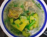 Hình bước làm 5 của món Canh gà nấu với khóm và khổ qua