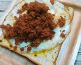 A picture of step 3 of Pork Floss and Fried Egg Sandwich.
