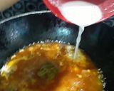 A picture of step 7 of Corn chicken meatball curry.