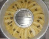 A picture of step 2 of Ring Cake with Apples, Raisins, and Dark Chocolate.