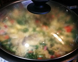 Foto del paso 8 de la receta: Arroz Nomen con alas de pollo, bimi y alcachofas