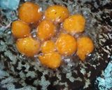 A picture of step 4 of Thaen Mittai/ Sugar candy.