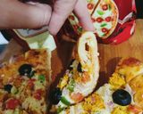 A picture of step 7 of Cheesy Bites Tikka Pizza 🍕🍕.