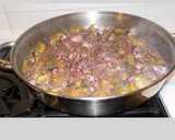 Foto del paso 21 de la receta: Puntilla con alcachofas y ajos tiernos