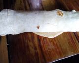 A picture of step 3 of Chicken avocado salad roll ups.