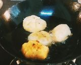 A picture of step 4 of Coconut Lobongo Lotika.