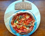Une image de l'étape 6 de Pizza tomates cerises et fleurs de courgettes.