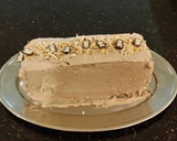 A picture of step 24 of Chocolate Layer Torte with Coconut Cream Filling and Frosting.